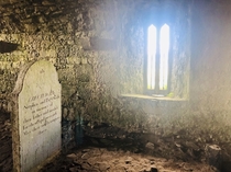 Abandoned monastery in County Clare Ireland With inside grave
