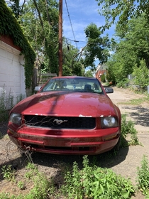 Abandoned Mustang on Pittsburghs East Side - inspection stickers from 