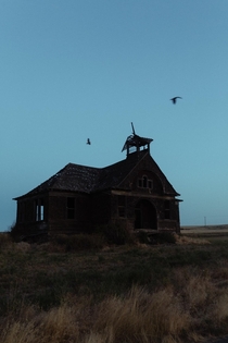Abandoned schoolhouse at dawn