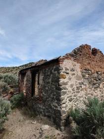 Abandoned shack somewhere along Nevadas lonely Highway  
