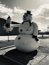 Abandoned snowman statue Ontario Canada