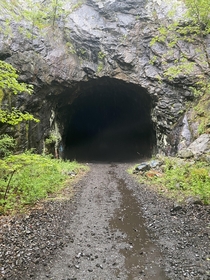 Abandoned Train tunnel on a rainy day It was made in the early s as part of the Lackawanna Cutoff and abandoned in 