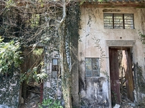 Abandoned village in the jungle Hong Kong The village was abandoned in the s and today the houses are in various states of dilapidation
