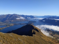 Above the clouds at Roys Peak New Zealand 