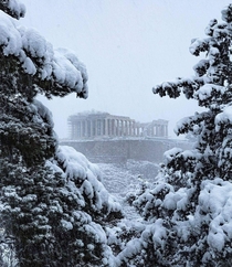 Acropolis of Athens with snowfall from this year