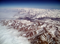 Aerial view of the Andes mountains Photo by Noumenon 