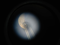 Airplane flew in front of telescope while observing the moon