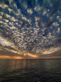 Amazing clouds on a beautiful sunset at the sea