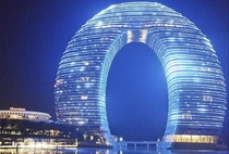 Amazing light shows and an underwater bridge connecting the Sheraton Huzhou Hot Spring Resorts two towers highlight the hotel by Yansong Ma and Shanghai Feizhou Group in Huzhou China Completed in 