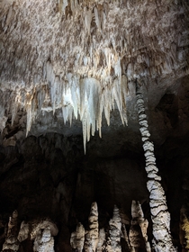 Amazing stalactites stalagmites and columns in an enormous cave system 