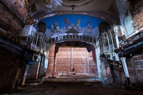 American theatre with a beautiful blue proscenium arch 