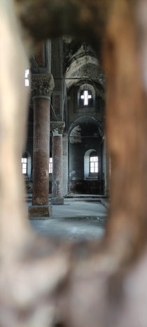 An abandoned church in Derinkuyu Turkey Doors were closed and just this tiny slot to look inside