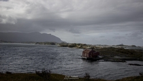 An abandoned fishermans cabin by The Atlantic Road Norway 