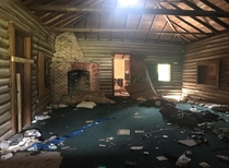An abandoned log cabin just across Disney Worlds property line Now demolished