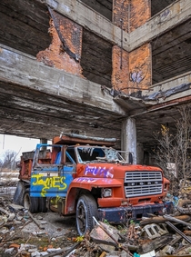 An abandoned truck that has been here for years inside the abandoned Packard Plant