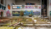 An atrium area of an abandoned high school