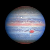 An image of Jupiter taken by NASAs Hubble Space Telescope in ultraviolet visible and near-infrared light on Aug  