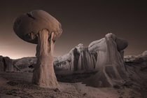 An infrared image at dusk of clay rock formations in Ah-Shi-Sle-Pah Wilderness in Farmington New Mexico Photo by David Clapp 