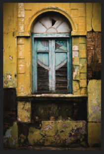 An old window in an centenary building Cuiab Brazil