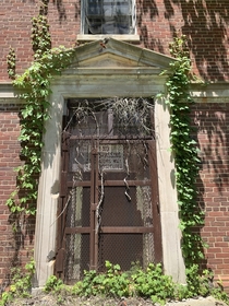 An ornate sealed hospital door