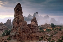 An otherworldly feeling on a stormy morning in Arches National Park Utah 