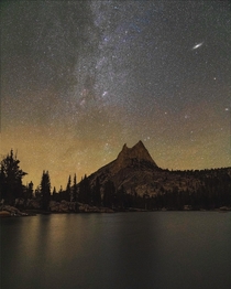 Andromeda and Milky Way galaxies over Cathedral Peak in Yosemite