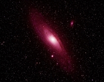 Andromeda Galaxy captured with DSLR camera attached with  mm lens set for  sec on a guider