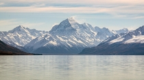 Aoraki - Mount Cook with high winds at the summit and a glass-off on Lake Pukaki 