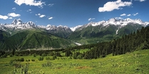 As seen from Svaneti Georgia the Caucasus Mountains form the natural border between Europe and Asia  Photo by Wikipedia user Polscience