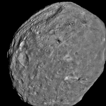 Asteroid Vesta It is the brightest most visible dwarf planet from earth Notice one side is heavily created the other side not so Notice too the stretch marks at the top believed to be caused by a massive impact NASAx
