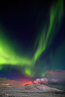 Aurora over an erupting volcano near Grindavk Iceland  by Christopher Mathews 