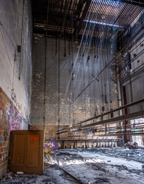 Backstage of an abandoned school auditorium