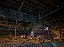 Bad-ass purple Mack truck in an old granite mill OC x