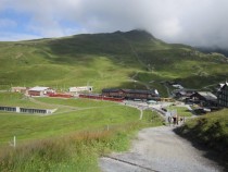 Bahnhof Kleine Scheidegg trainstation at m 
with trains leaving in  directions Grindelwald 
Switzerland 