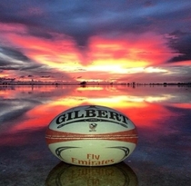 Beach sunset and rugby