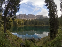 Between Rain Clouds - Dolomites Carezza Lake 