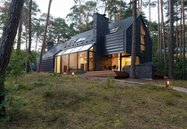 Black House In Kulautuva Forest Lithuania 
