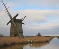 Bograve Mill is an abandoned windpump in Norfolk England and was in use from  to roughly  Its westward lean gave rise to a myth that a furious Devil tried to foil Brograves drainage efforts by blowing it down bonus swans 