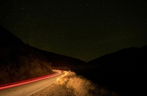 Bouquet Canyon CA  - My first attempt at a starry landscape I thought the car passing by would ruin my exposure but I think it makes the picture