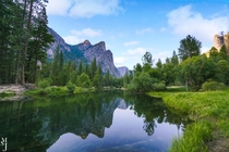 Breathtaking view of Three Brothers reflected in Merced River in Yosemite National Park USA  IG mysuitcasejourneys