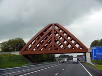 Bridge made from acetylated wood on the highway interchange for Stadsrondweg-zuid and Akkerwinde located near Sneek the Netherlands 