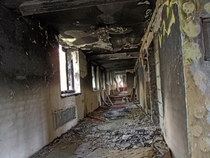 Burned down coridor in abandoned hotel in Poland