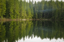 Calm morning on a mountain lake in Oregon 