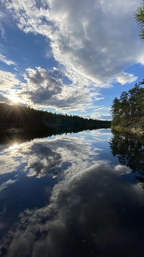 Catching fish doesnt seem that important anymore when the lake turns into a mirror Norwegian woods late summer Viken 