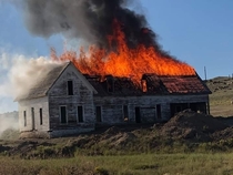 Caught this photo when someone torched one of the abandoned homesteads in my town