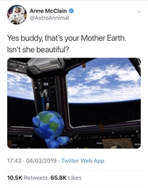 Celestial Buddy Earth peers out at Mother Earth from the ISS after hitching a ride on this weeks SpaceX Dragon test flight