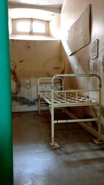 Cell in an abandoned prison 