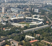 Chennai sub urban railway line with the MA Chidambaram stadium in the background