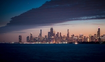 Chicago over the water photo by Ben Conrad