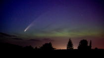Comet NEOWISE cutting through the Aurora Borealis in Beecher Wisconsin